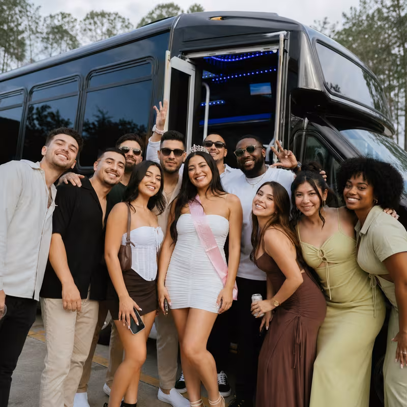 Party bus interior with wraparound leather seating and LED lighting in Pasadena